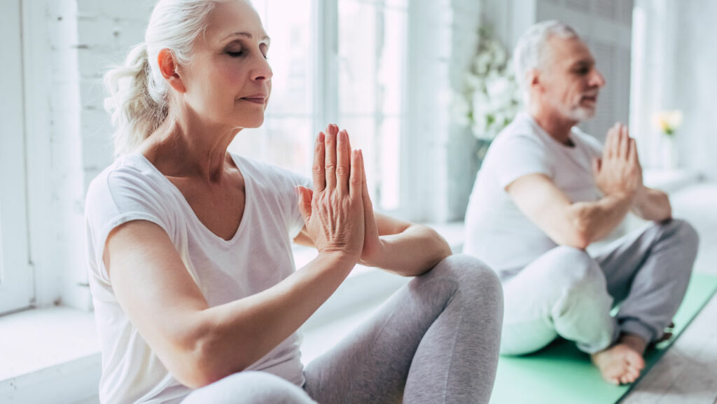 Senior citizen doing meditation & yoga Senior citizen doing meditation & yoga